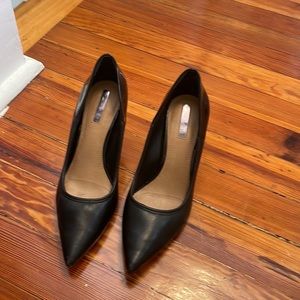 Great condition black leather with shiny leather on the back and heels!